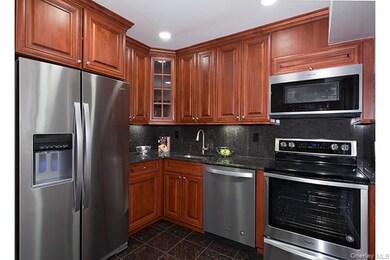 1 Villa D'Est Dr unit A-09, Coram, NY 11727 - photo 2