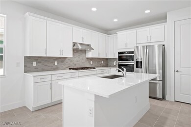 Gorgeous, kitchen layout with quartz countertops,