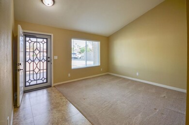 Living room with vaulted ceilings