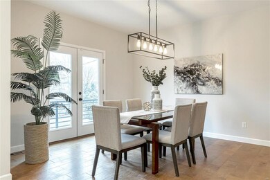 Wide plank wood flooring throughout the home.