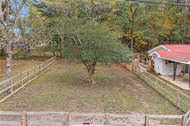 View of fenced backyard