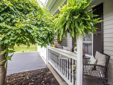 Front porch offers great spot to sit.