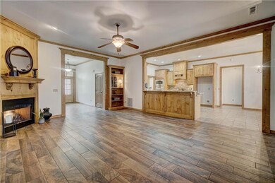 Open living, dining and kitchen with breakfast bar