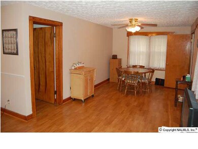 Dining room with new laminate wood floors!