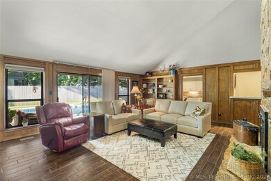 VAULTED CEILING IN FAMILY ROOM WITH WALL OF WINDOW