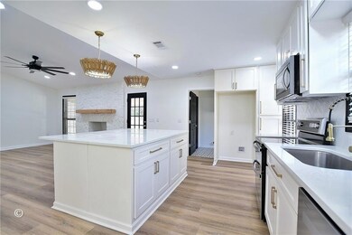Kitchen featuring visible vents, recessed lighting