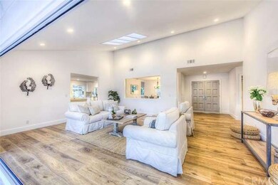 Looking into living room from open glass wall unit