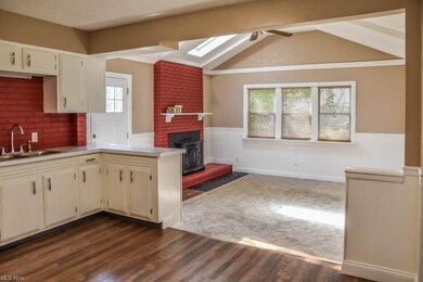 The kitchen opens to the family room.