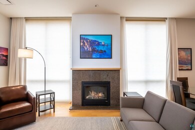 Living room featuring light hardwood / wood-style 