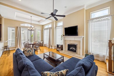 Enjoy tons of natural light, high ceilings, crown