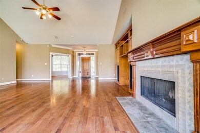 Unfurnished living room featuring light wood-style