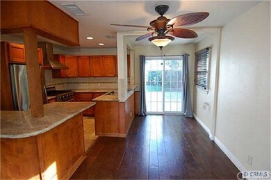 Dining/Living room combo with nice fan. glass slid