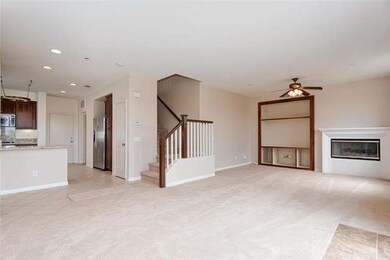 View of the Living room with cozy fireplace, built