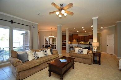Crown molding throughout and stone gas fireplace
