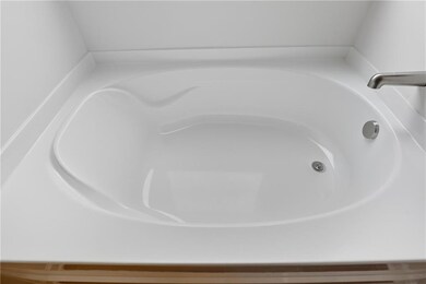 Bathroom view of a tub