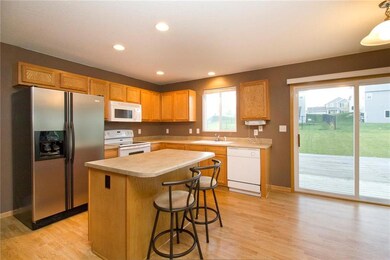Kitchen opens to over-size back deck.
