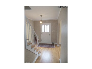 The foyer welcomes you into the home with beautifu