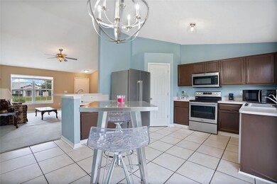 Kitchen looking into living room