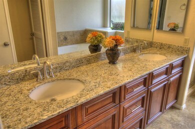 Granite & Under-Mount Sinks in Master!