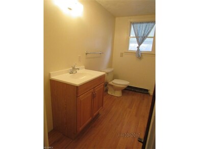 Full bath on first floor w/new laminate flooring.