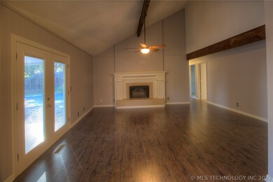 Last view of the living room, hallway to bedrooms