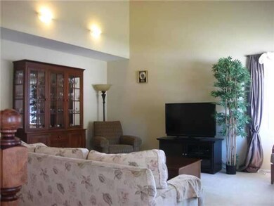 Large living room with new paint, carpet and wall 