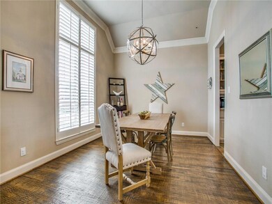 Plantation shutters adorn the window of the formal