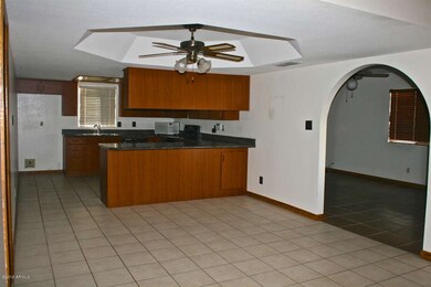 Kitchen opens to family area