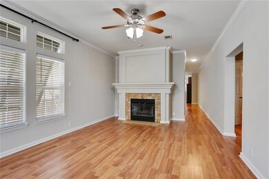 LIVING ROOM WITH WOOD BURNING FIREPLACE. HALLWAY L