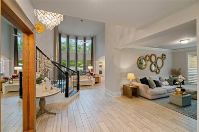 This spacious and elegant home features a grand en