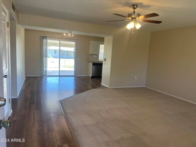 Living Room looking into dining and kitchen