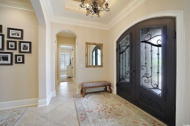 Foyer entrance with tile patterned flooring, a not