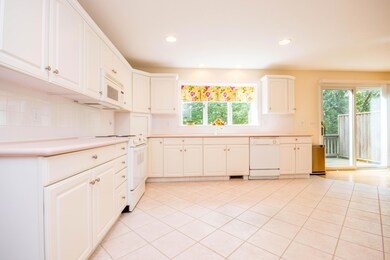 Kitchen with slider to deck