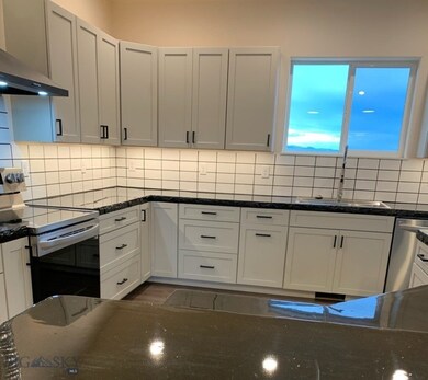 Under cabinet lighting, concrete counter top & til