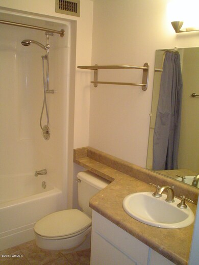 REFINISHED SHOWER AND TUB