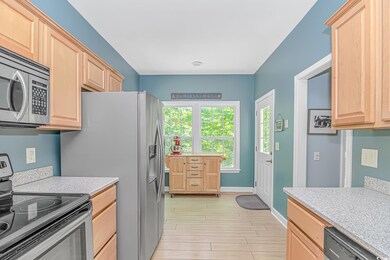 Kitchen featuring appliances with stainless steel 