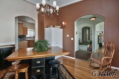 The formal dining room and office are both clad in