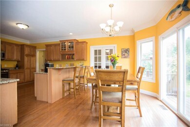 Appliancesstay in this large, open, eat-in kitchen