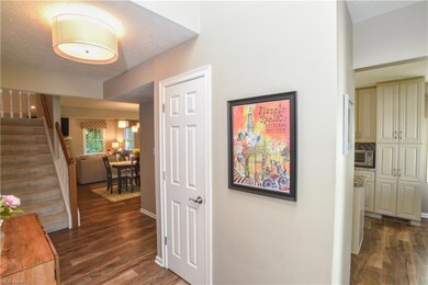 The kitchen is off the main entry hall, to the rig