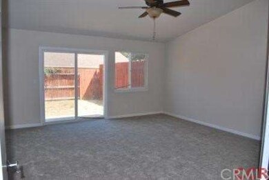 large master bedroom with slider to back yard