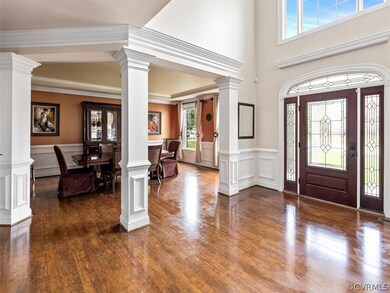 2-Story entry, opens to Living and Dining Room