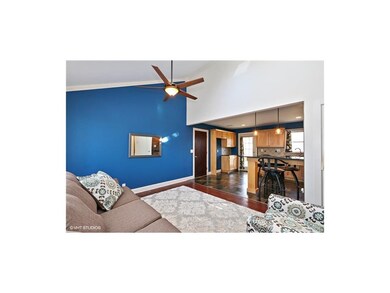 Open Floorplan Flows Into Remodeled Kitchen and Pa