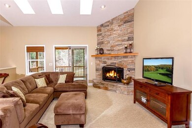 Light & bright great room with skylights and doors