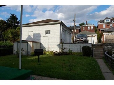 Yard/Garden. Rear yard and garage