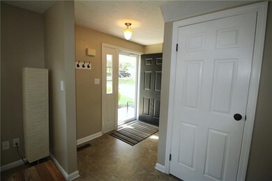 The entry has a guest closet and powder room.