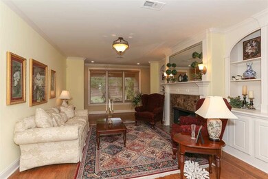 Formal Living Room with beautiful fireplace and cu