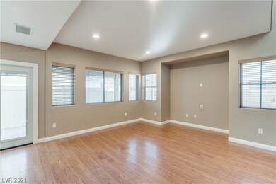 Living room with French door leading to backyard p