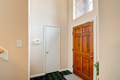 Just inside you have a coat closet and a half bath, convenient for guests!