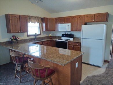 Kitchen complete with granite countertops