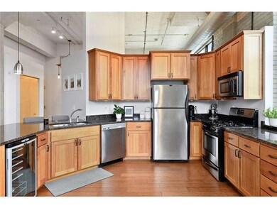 Spacious kitchen with granite counters and stainle
